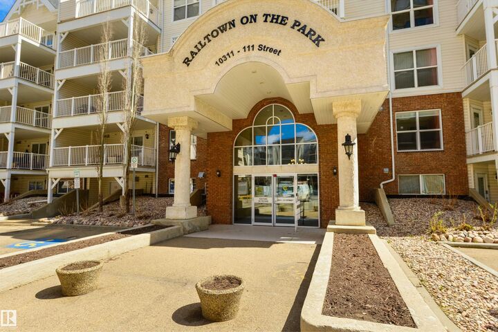 Property Photo:  10311 111 Street NW 112  AB T5K 2Y8 