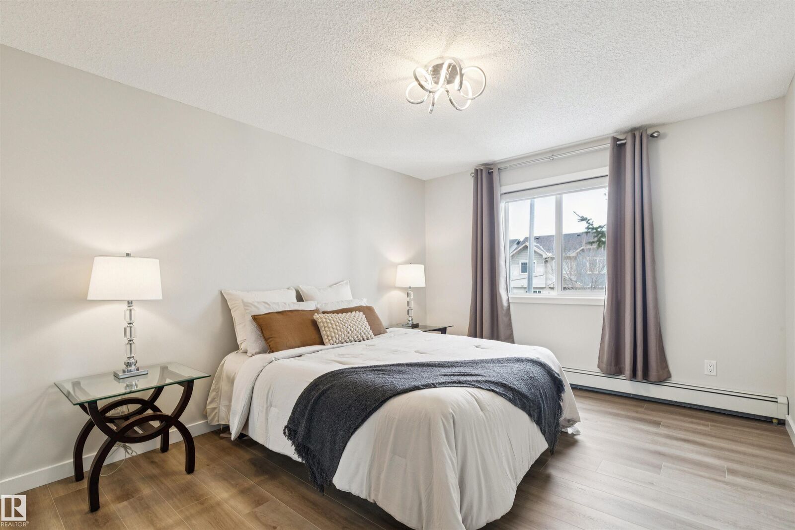 Property Photo:  14808 125 Street NW 206  AB T5X 0G1 