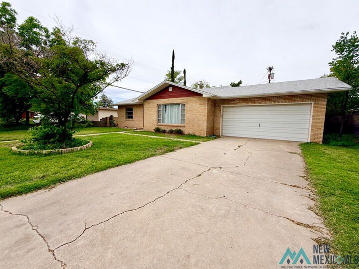 Property Photo:  1111 N Ural Street  NM 88220 