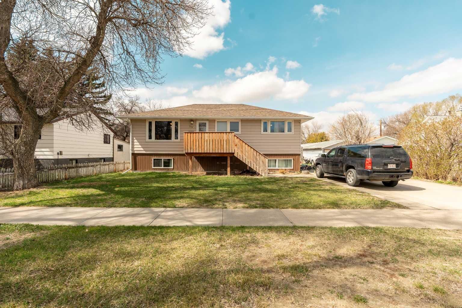 Property Photo:  5816 52 Street  AB T1G 1K7 
