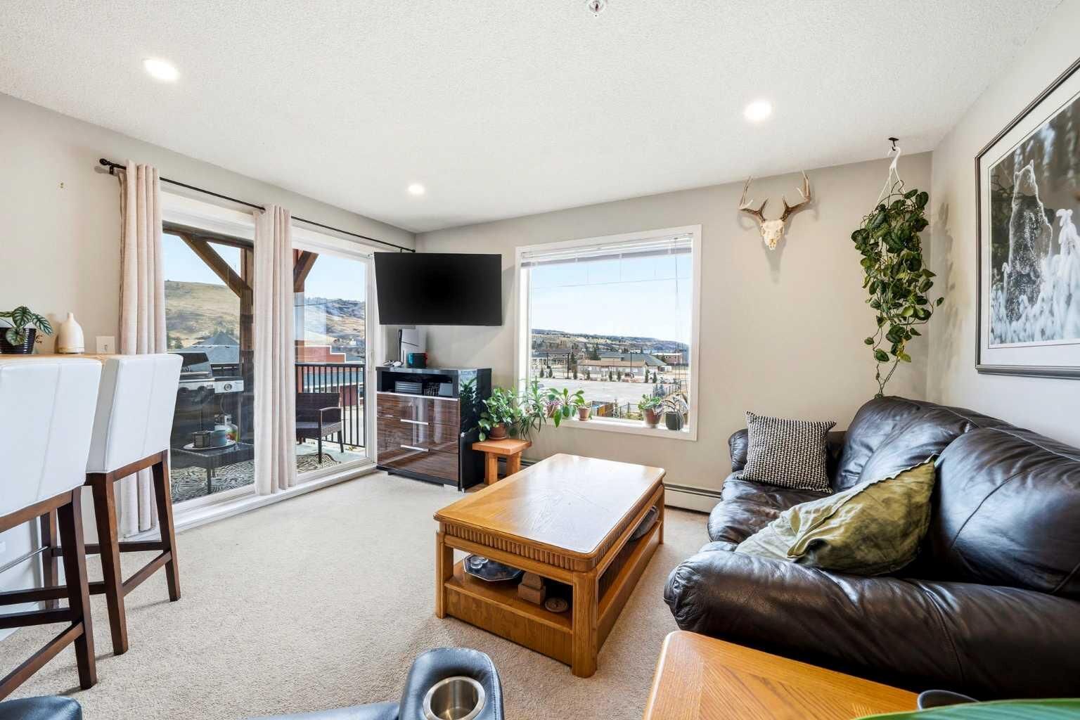 Property Photo:  505 Railway Street 2324  AB T4C 2K9 