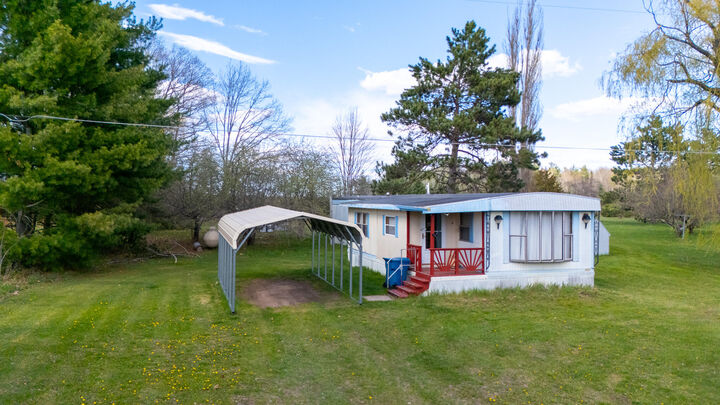 Property Photo:  612 Michelson Road  MI 48629 