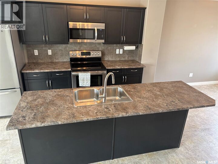 Property Photo:  4501 Green Poplar Lane E  SK S4V 3A5 