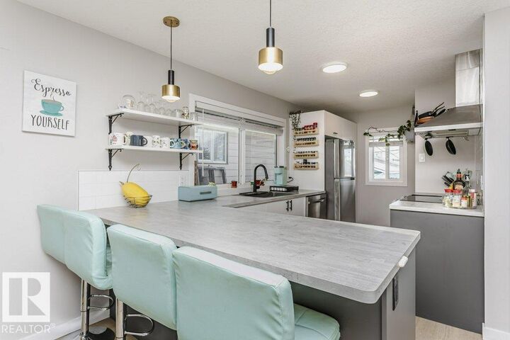 Property Photo:  9020 152 Street NW  AB T5R 1M3 