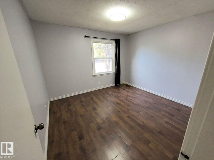 Property Photo:  10815 68 Avenue NW  AB T6H 2B7 