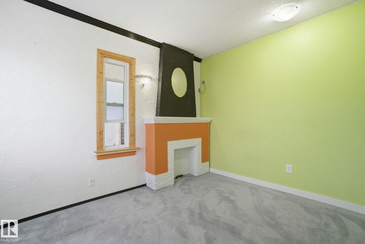 Property Photo:  11514 92 Street NW  AB T5G 0Z7 