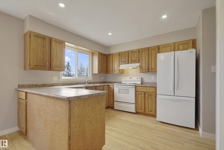 Property Photo:  10612 158 Avenue NW  AB T5X 4H5 