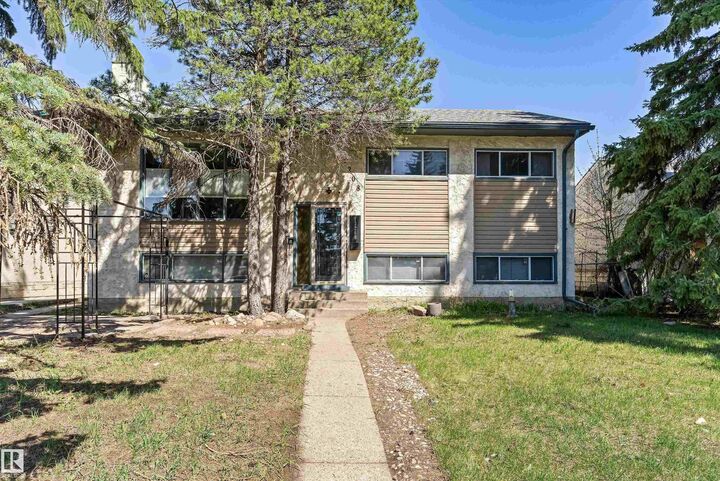 Property Photo:  13208 128 Avenue NW  AB T5L 3H2 