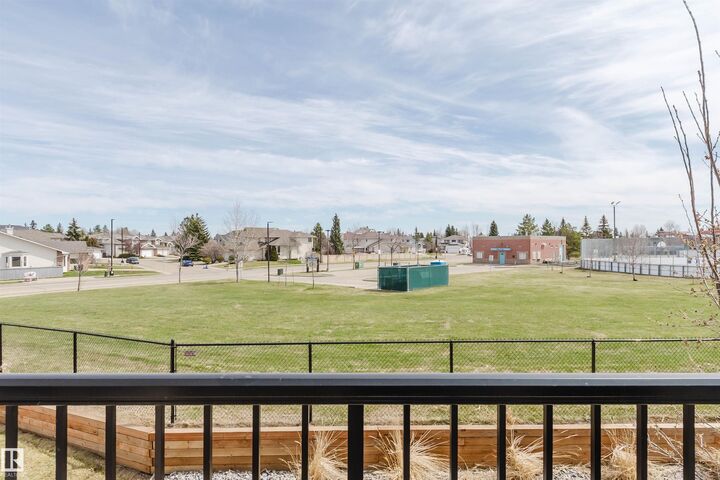 Property Photo:  11373 12 Avenue NW 3  AB T6J 5V2 