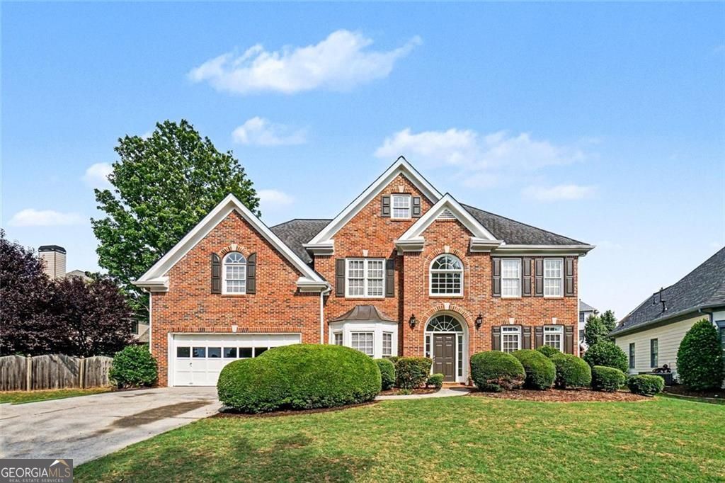 Property Photo:  710 Wilde Rose Court  GA 30075 
