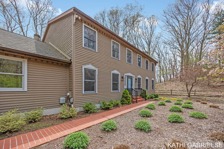 Property Photo:  313 Stickney Ridge Road  MI 49417 