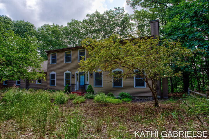 Property Photo:  313 Stickney Ridge Road  MI 49417 