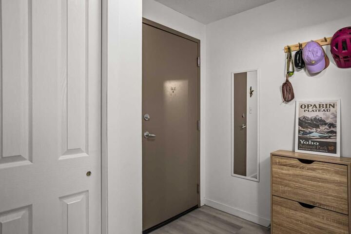 Property Photo: 186 Kananaskis Way 1 AB T1W 0A2