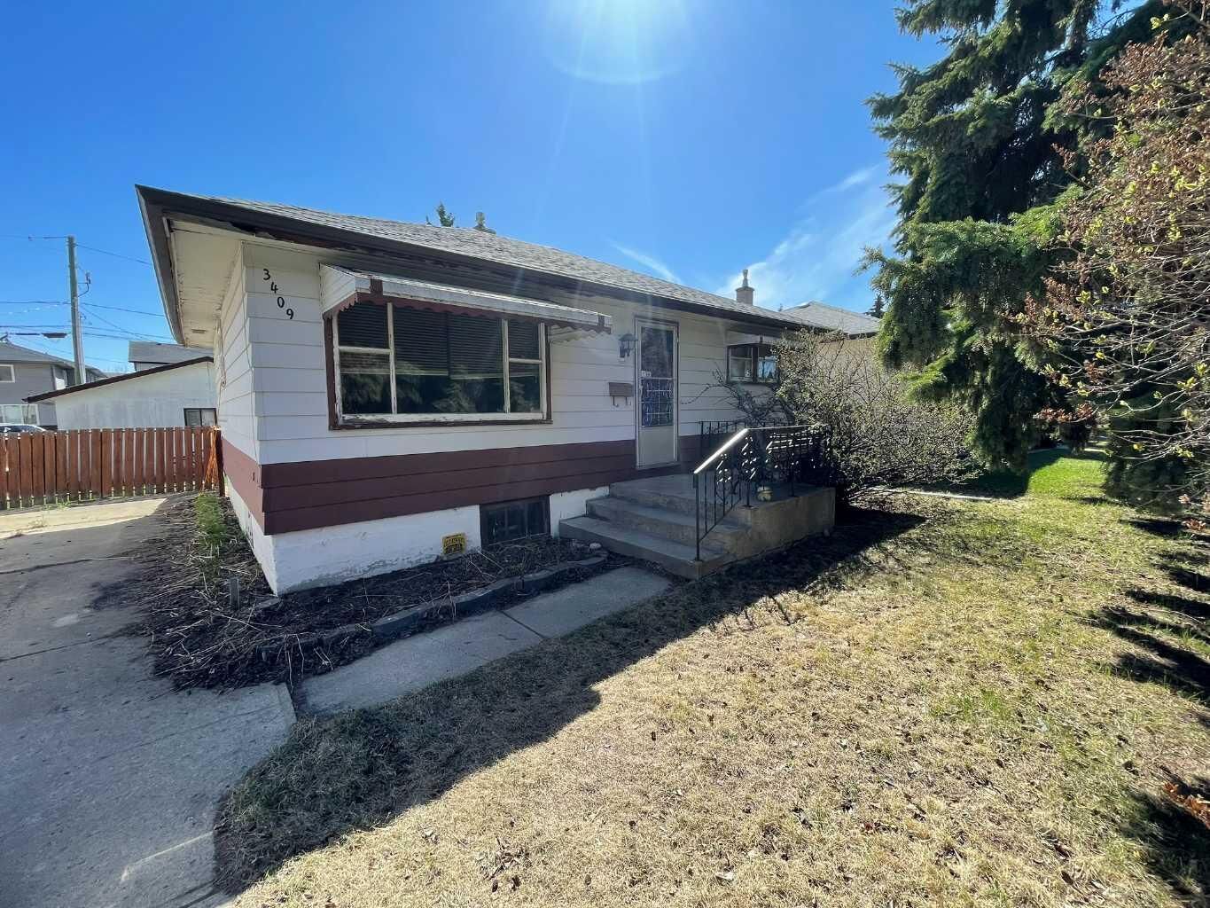 Property Photo:  3409 52 Avenue  AB T4N 4J3 