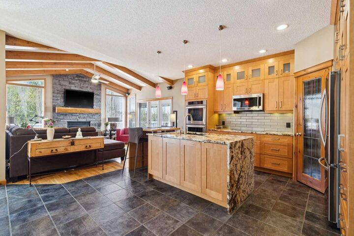 Property Photo:  128 Tuscany Vista Crescent NW  AB T3L 3A2 