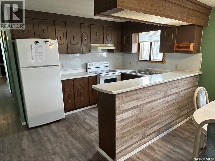 Property Photo:  110 4th Street  SK S0C 0A0 