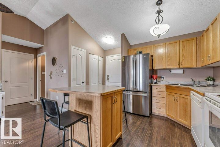 Property Photo:  3425 19 Street NW 404  AB T6T 2B5 