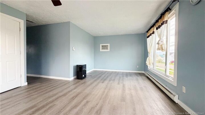 Property Photo:  118 Cedar Street  NB E1C 7L4 