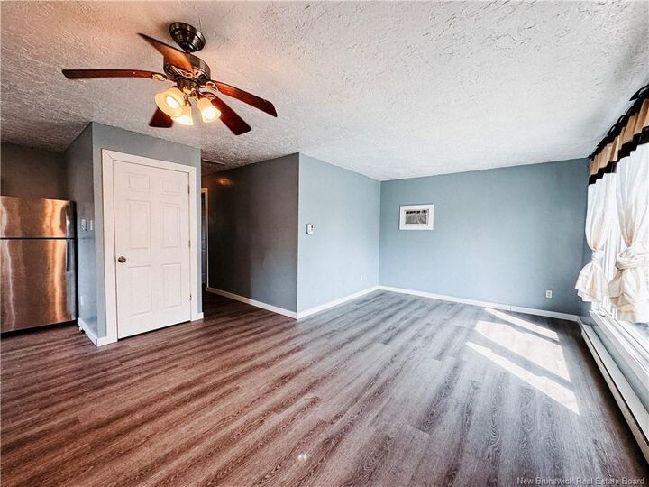 Property Photo: 118 Cedar Street NB E1C 7L4