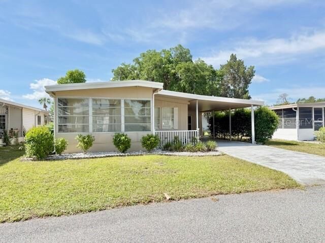 Property Photo: 129 Malayon Way FL 34788