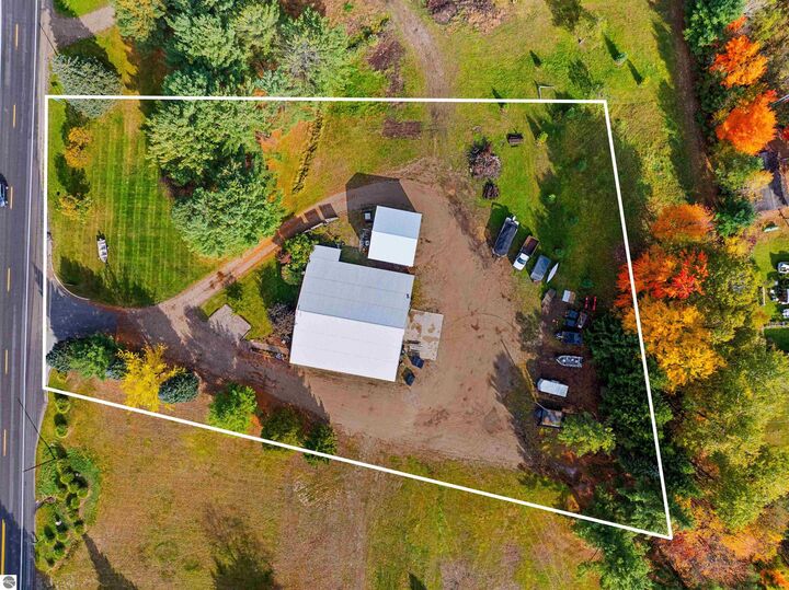Property Photo:  3123 M-88  MI 49615 