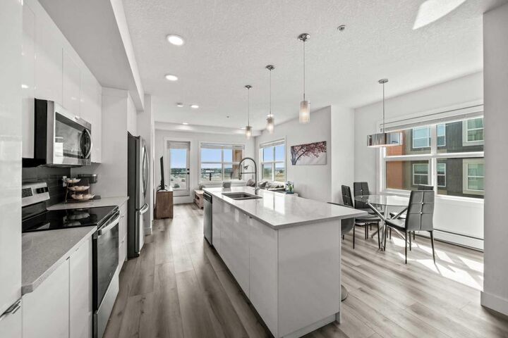 Property Photo:  19661 40 Street SE 305  AB T3M 3H3 