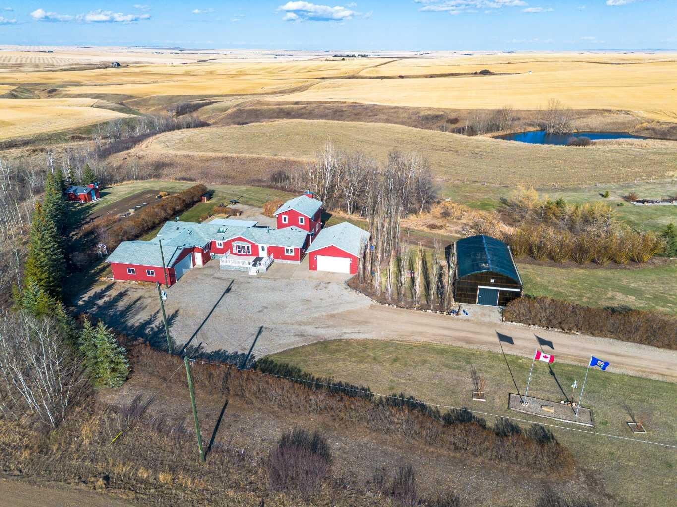 Property Photo:  313029 Rge Rd 233  AB T0M 2A0 