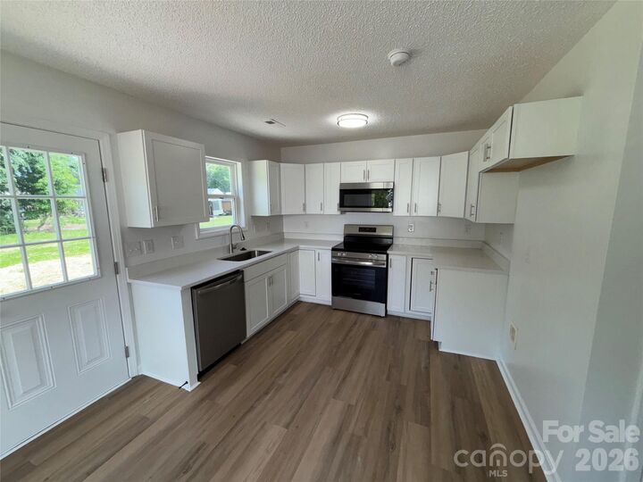 Property Photo:  1002 Crescent Way  NC 28174 