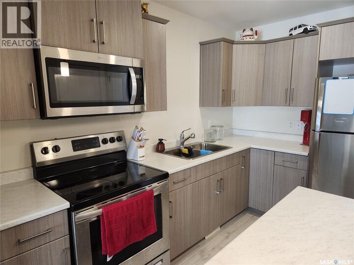 Property Photo:  #212 315 Dickson Crescent  SK S7T 0T8 