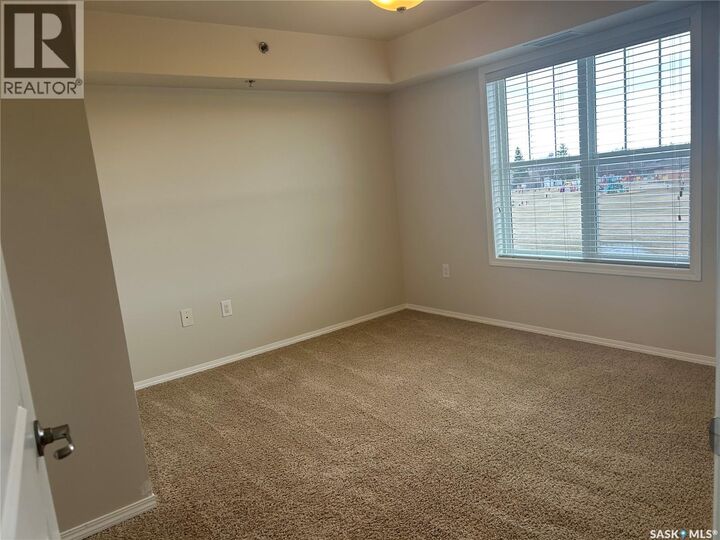 Property Photo:  403 601 110th Avenue  SK S0E 1T0 