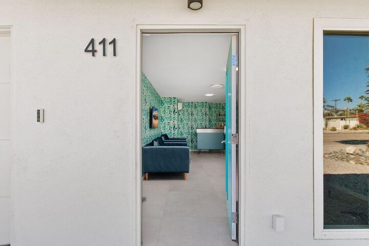 Property Photo:  411 E Racquet Club Road  CA 92262 