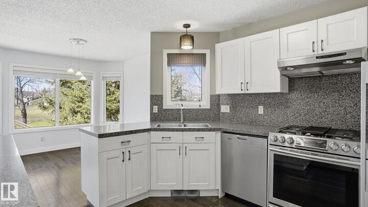Property Photo:  1346 Potter Greens Drive NW  AB T5T 6A3 