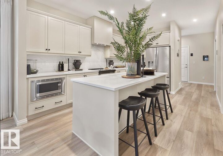 Property Photo:  12842 213A Street NW  AB T5S 0R5 