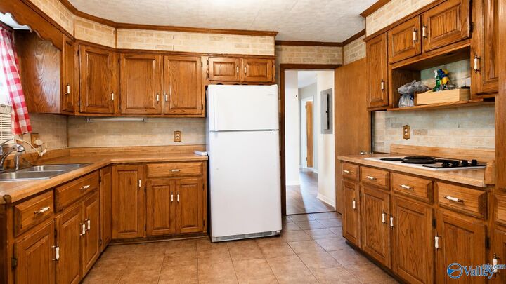 Property Photo:  1115 Raley Street  AL 35903 