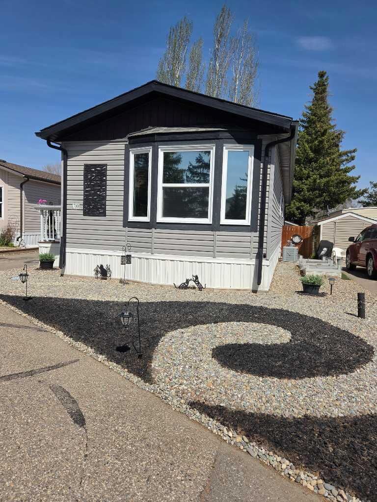 Property Photo:  2300 13th Street N 70  AB T1H 4E8 