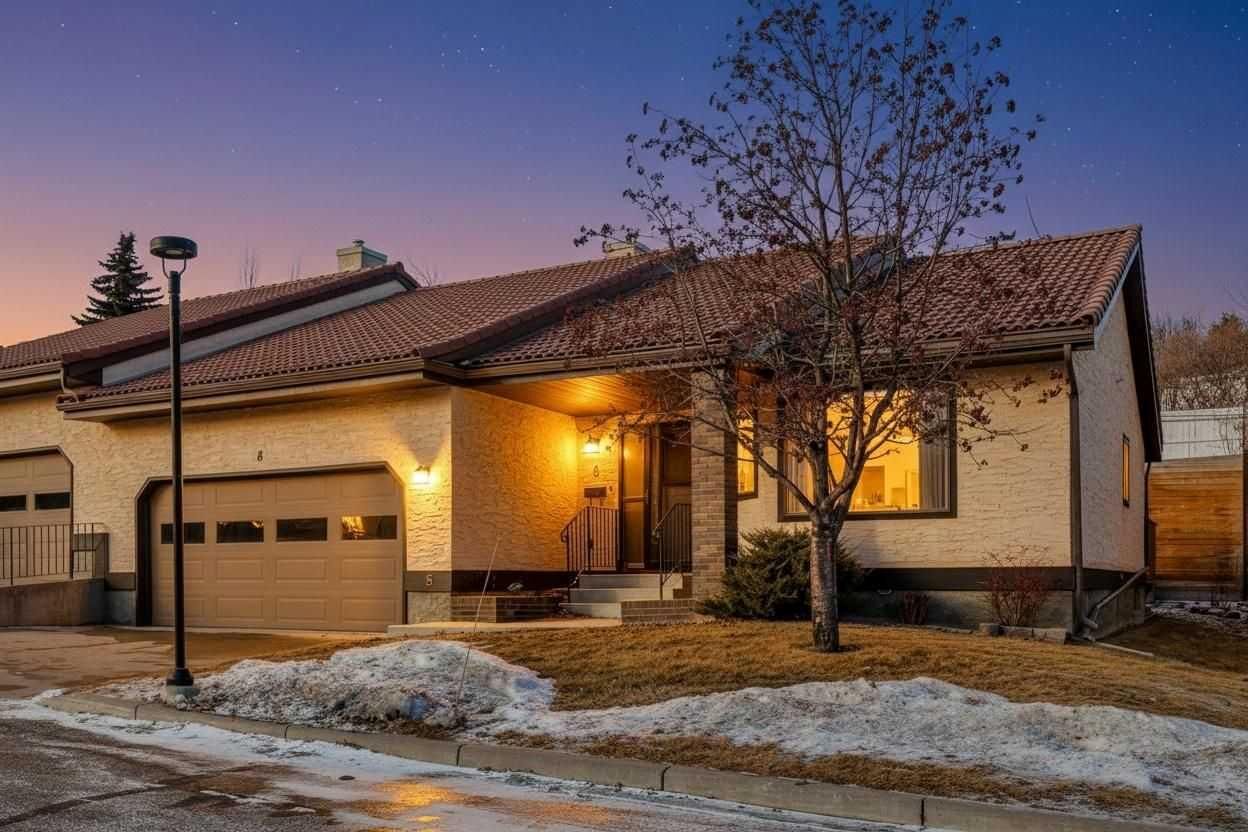 Property Photo:  118 Strathcona Road SW 8  AB T3H 1P3 