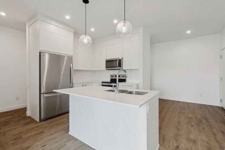 Property Photo: 681 Savanna Boulevard NE 1415 AB T3J 5N9