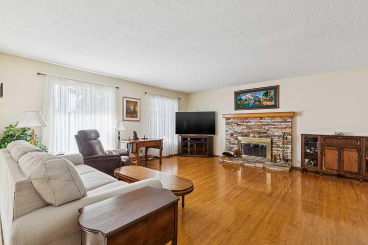 Property Photo:  11427 Wilkes Road SE  AB T2J 2E5 