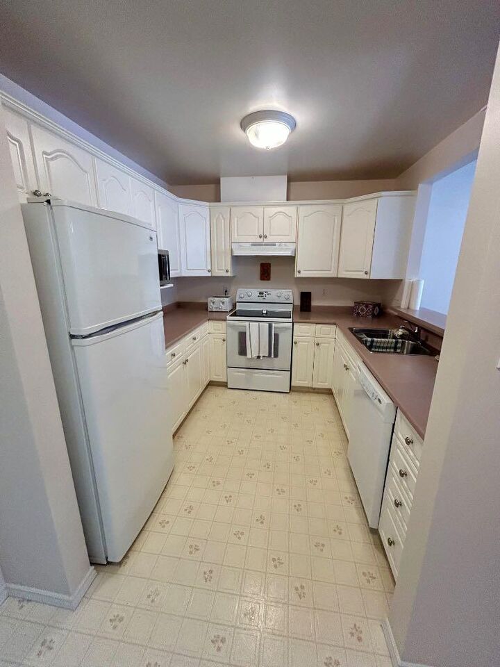Property Photo: 9028 Alberta Avenue 207 AB T0A 2C0