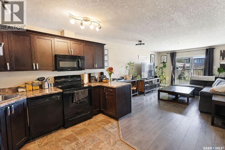 Property Photo:  102 1501 15th Street E  SK S6V 7C3 