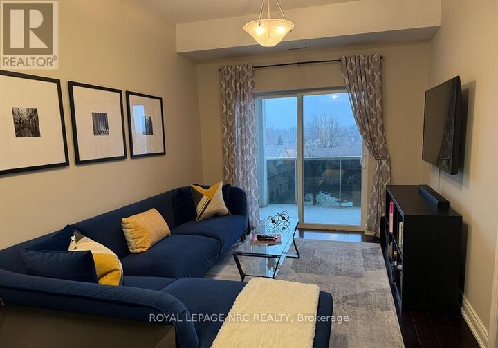 Property Photo:  8111 Forest Glen Drive 418  ON L2H 2Y7 