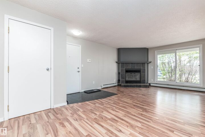 Property Photo:  328 Woodbridge Way 104  AB T8A 4G3 