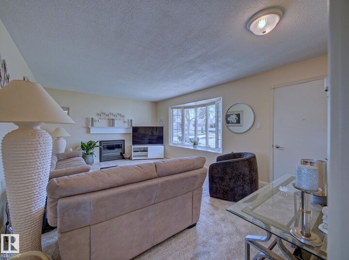 Property Photo:  8553 92 Avenue  AB T8L 1A1 