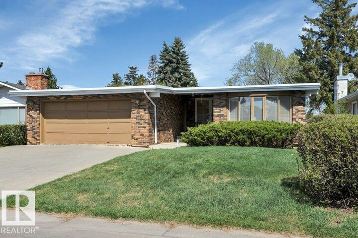 Property Photo:  8808 41 Avenue NW  AB T6K 1G7 