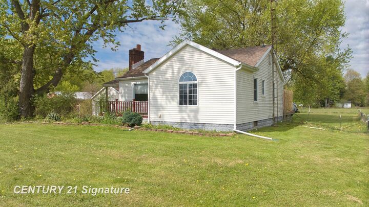 Property Photo:  10021 Clio Road  MI 48420 