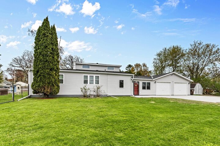 Property Photo:  305 Main Avenue N  MN 55006 