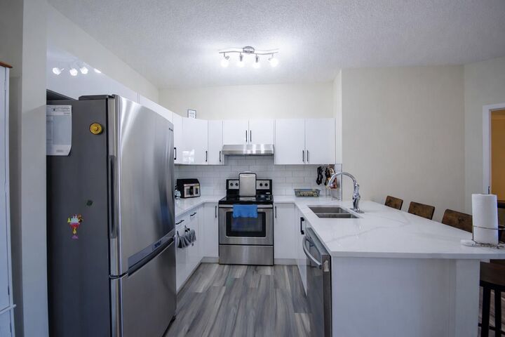 Property Photo: 1140 Taradale Drive NE 1117 AB T3G 0G1