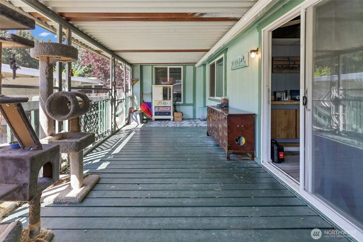 Property Photo: 5303 90th Street E 1 WA 98446