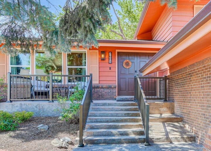 Property Photo: 7601 E Oxford Avenue CO 80237