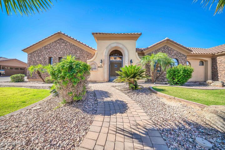 Property Photo:  18029 W San Juan Avenue  AZ 85340 